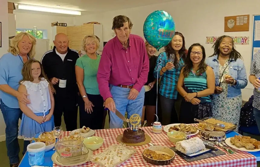 Graham Landon (centre) on his 80th birthday celebration at the Tennis Club.